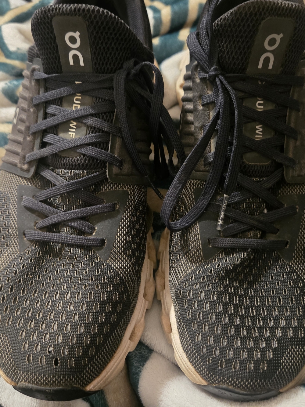 On Cloud Running Shoes in Black with White Soles